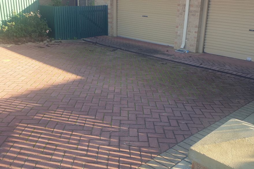 Brick paved driveway cleaning: before