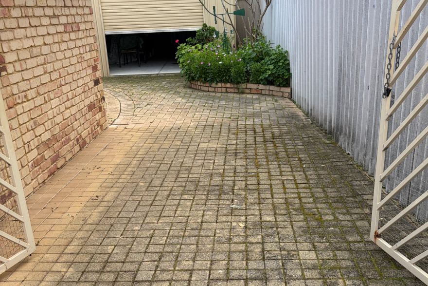 Cream brick paving: before