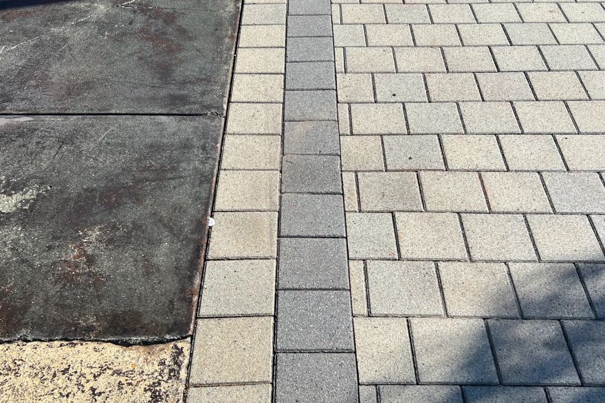 Paint splashed on paving: after
