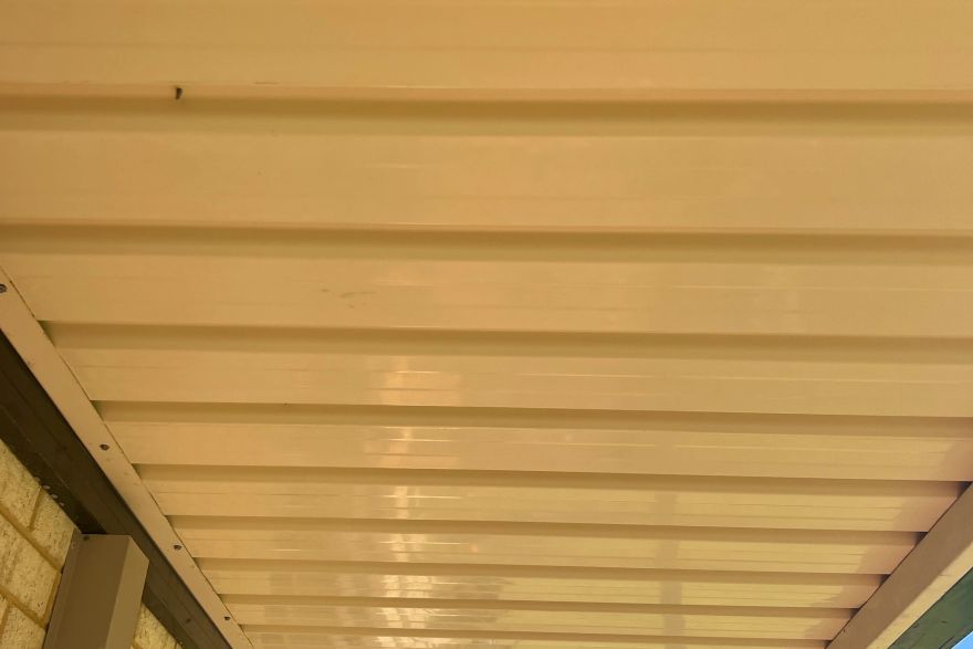 Cleaning beneath a patio roof: after
