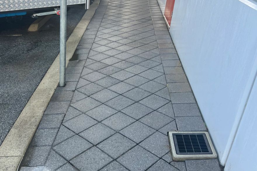 Before and after cleaning on brick pavers: after