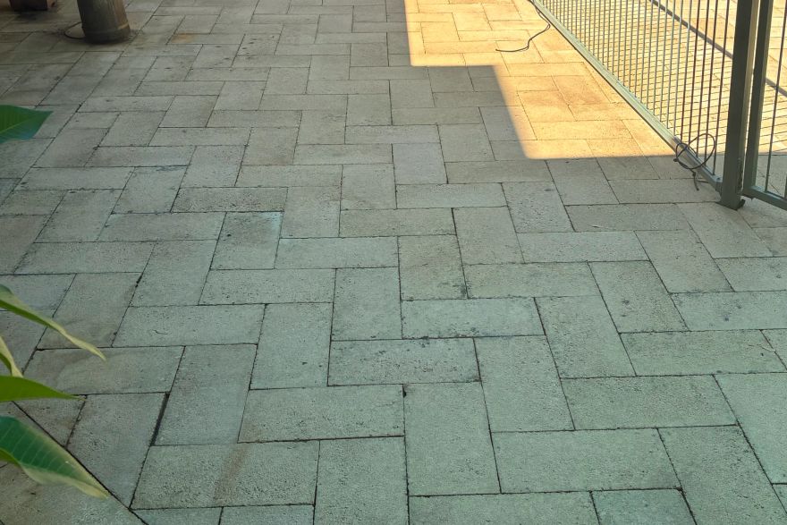 Before and after cleaning on brick pavers: after
