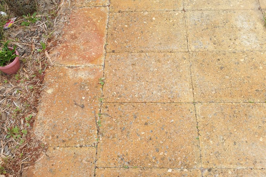 Before and after rust / bore stains on concrete slab: before