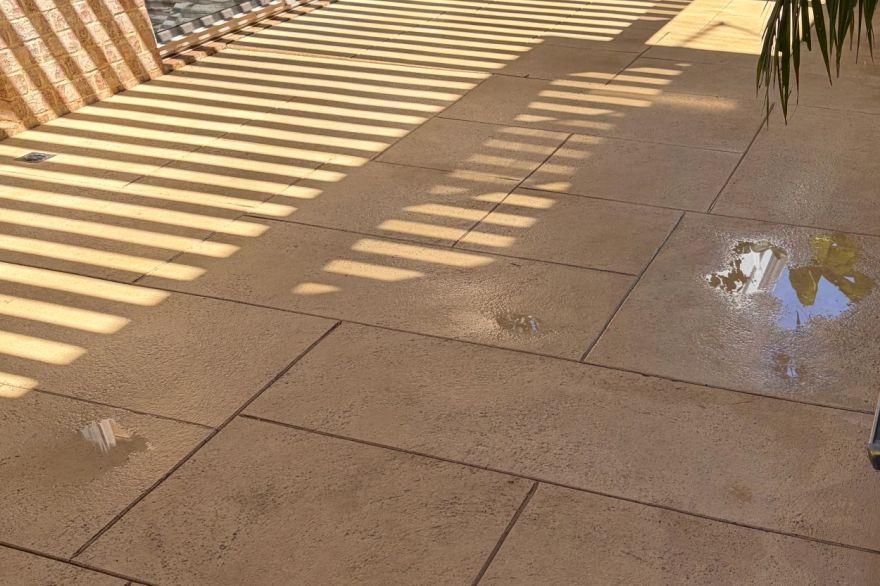 Before and after cleaning on liquid limestone · Patio / alfresco: after