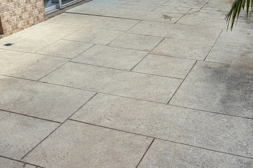 Before and after cleaning on liquid limestone · Patio / alfresco: before