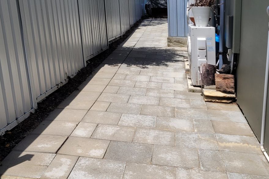 Before and after cleaning on concrete slab · Path: after