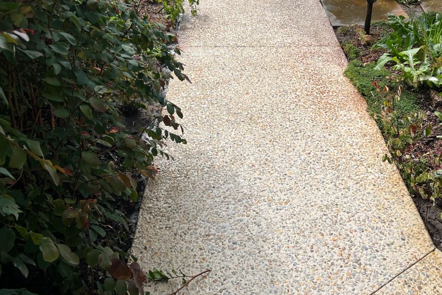 Before and after rust / bore stains on concrete exposed aggregate: after