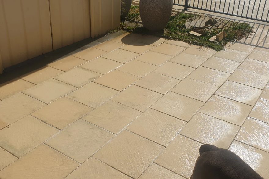Before and after cleaning on sandstone pavers: after