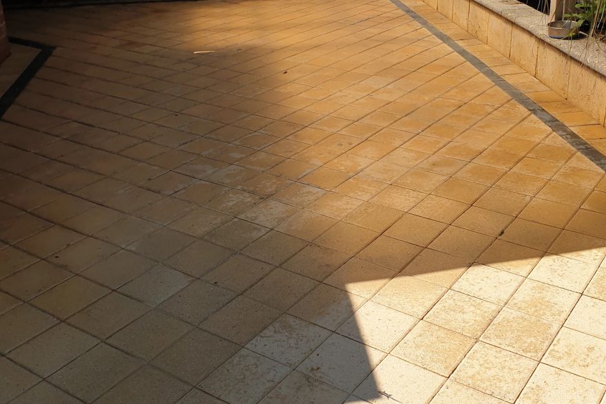 Before and after cleaning on brick pavers: after