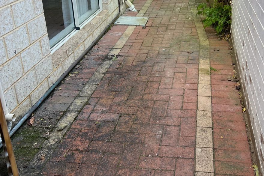 Before and after cleaning on brick pavers · Path: before