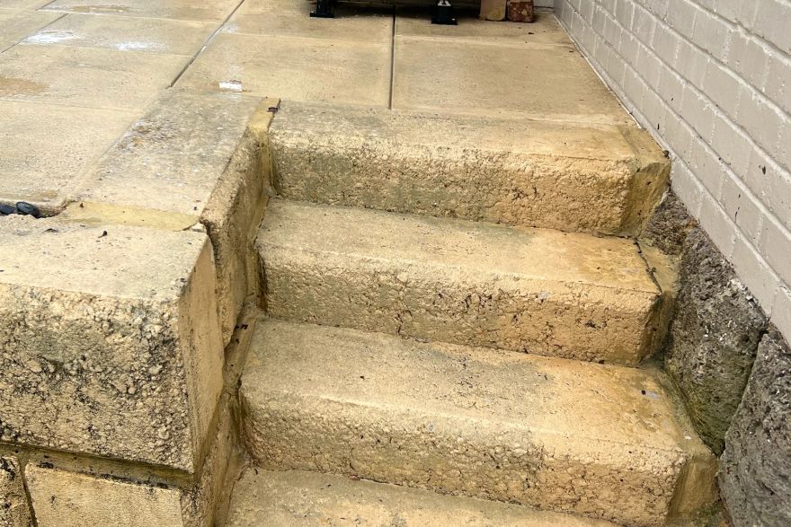 Before and after cleaning on limestone block: after