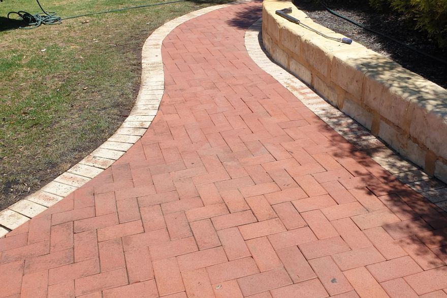Before and after rust / bore stains on brick pavers: after