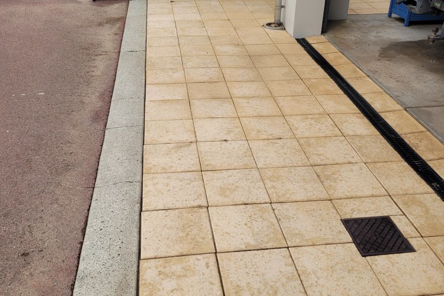 Before and after cleaning on sandstone pavers: after