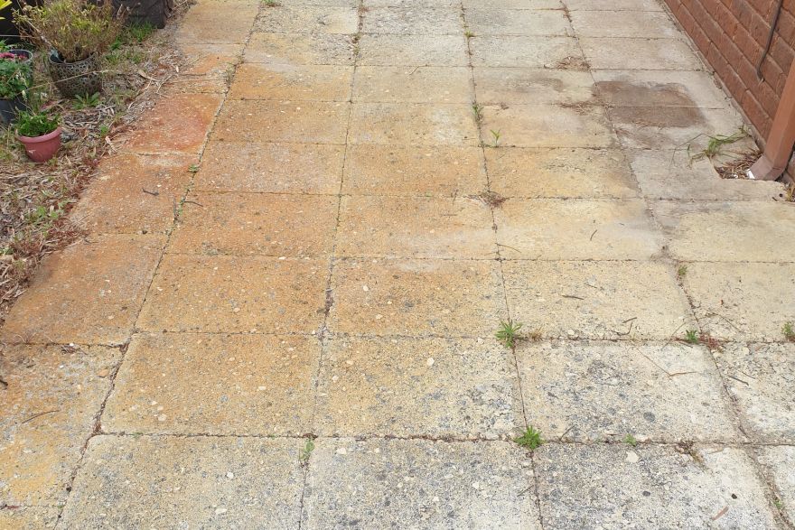 Before and after rust / bore stains on concrete slab: before