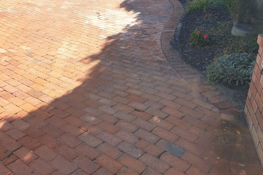 Before and after cleaning on brick pavers: after