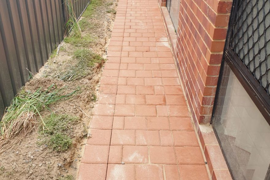 Before and after cleaning on brick pavers: after