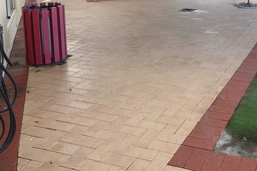 Before and after cleaning on brick pavers: after