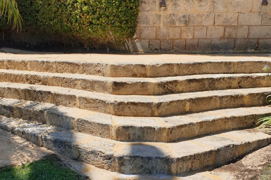 Before and after cleaning on limestone block: after