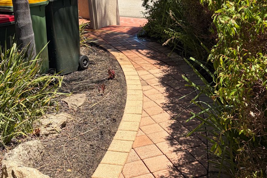Before and after cleaning on brick pavers: after