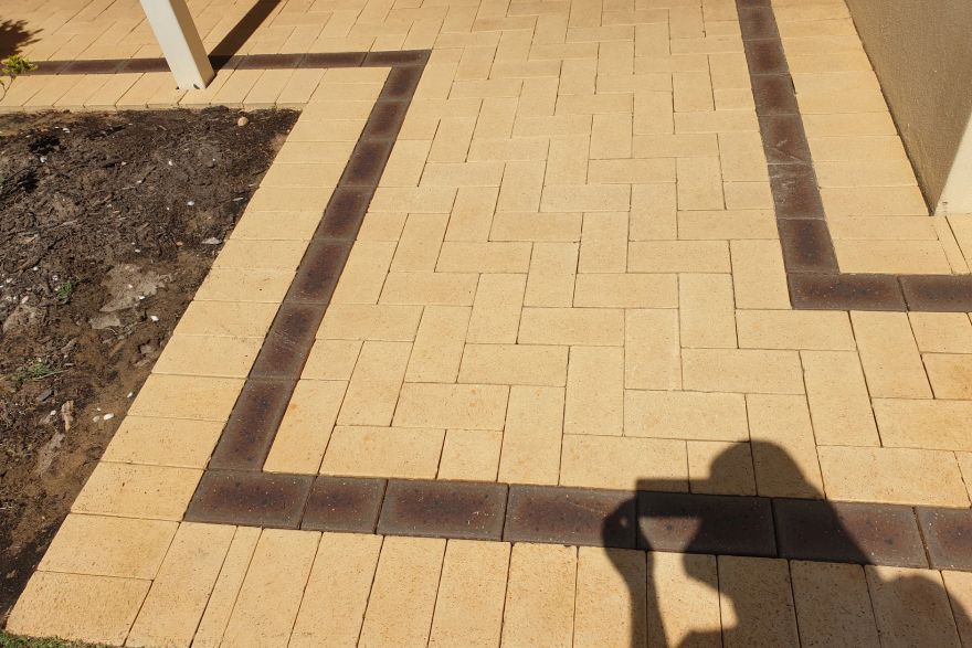 Before and after cleaning on brick pavers: after