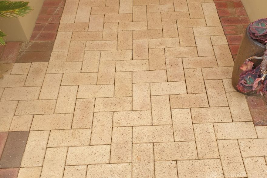 Before and after cleaning on brick pavers: after