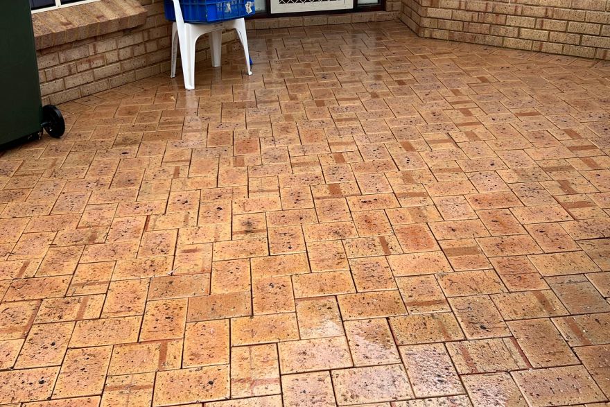 Before and after cleaning on brick pavers: after