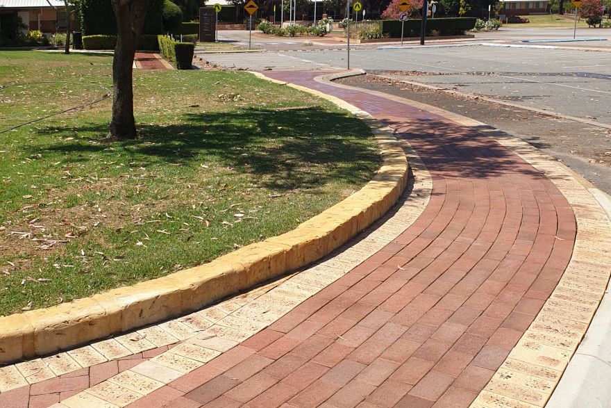 Before and after rust / bore stains on brick pavers: after