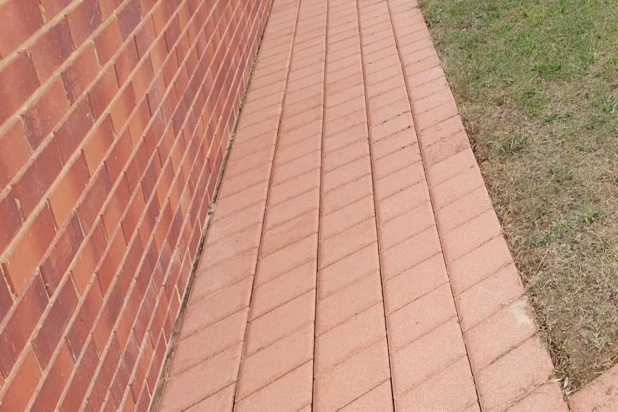 Before and after cleaning on brick pavers: after