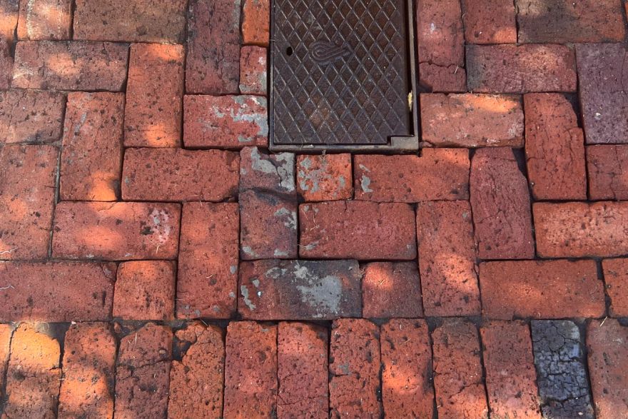 Before and after cleaning on brick pavers: after