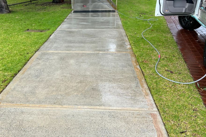 Before and after cleaning on concrete slab · Path: after