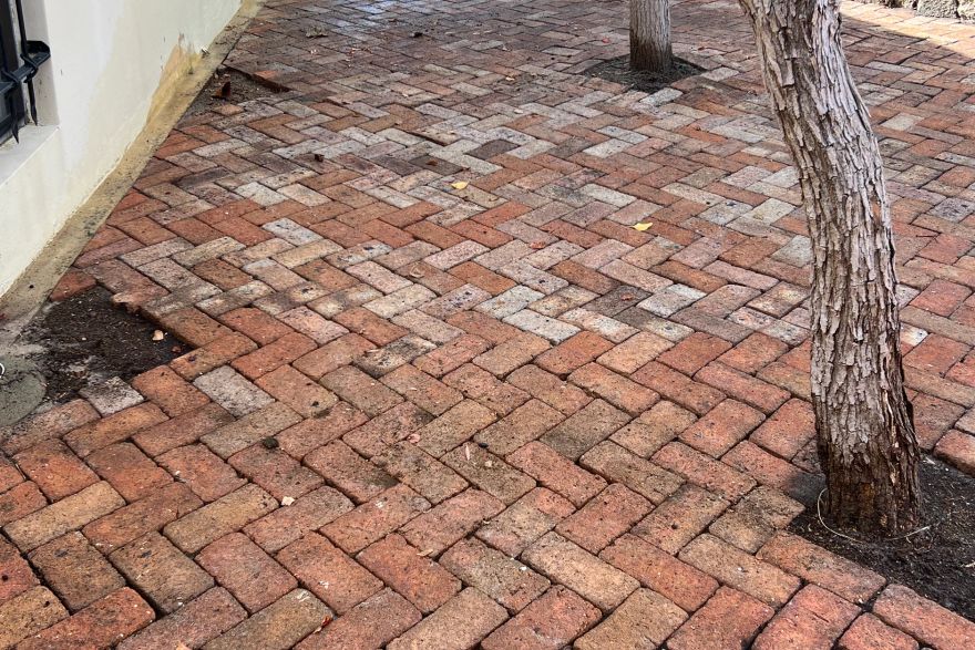 Before and after cleaning on brick pavers: after