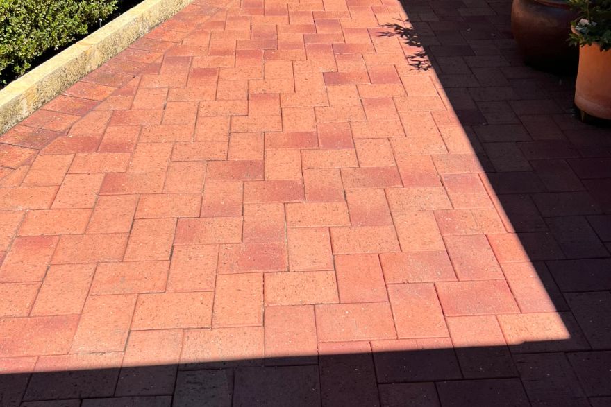 Before and after cleaning on brick pavers: after