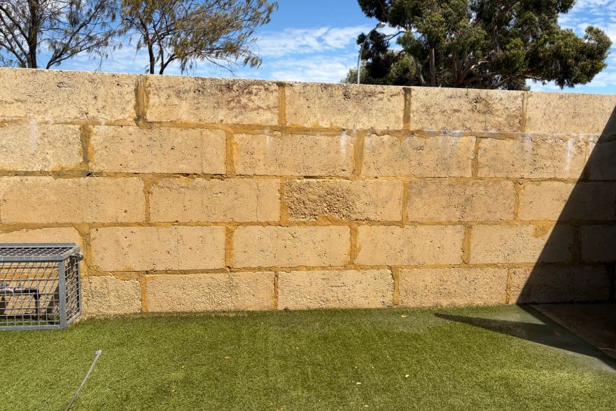 Before and after graffiti on limestone block: after