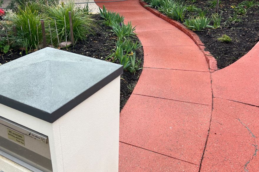Before and after cleaning on concrete slab · Driveway: after