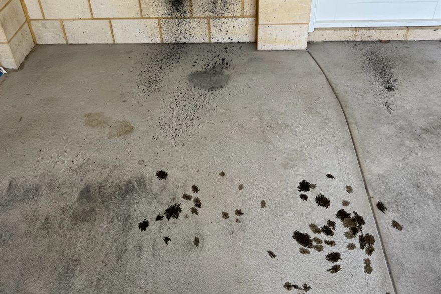 Before and after oil stains on concrete slab · Garage floor: before