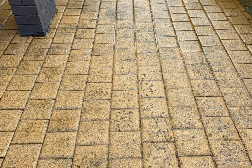 Before and after cleaning on brick pavers: after