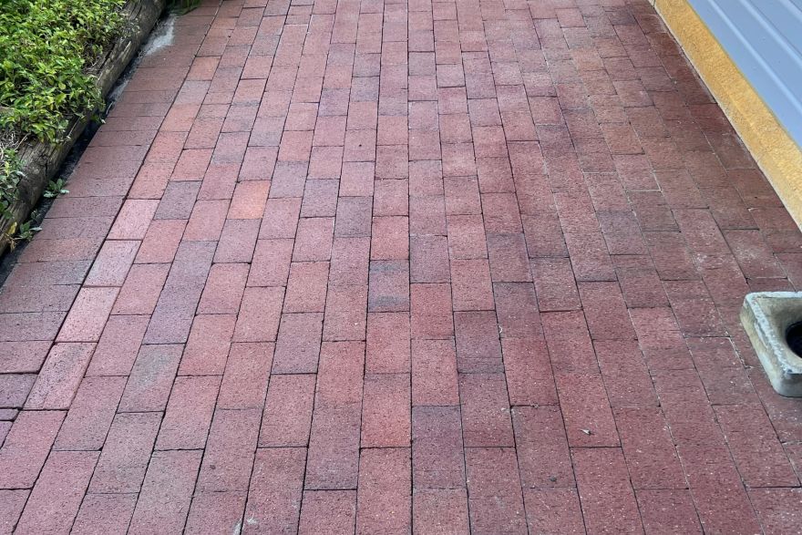 Before and after paint removal on brick pavers: after