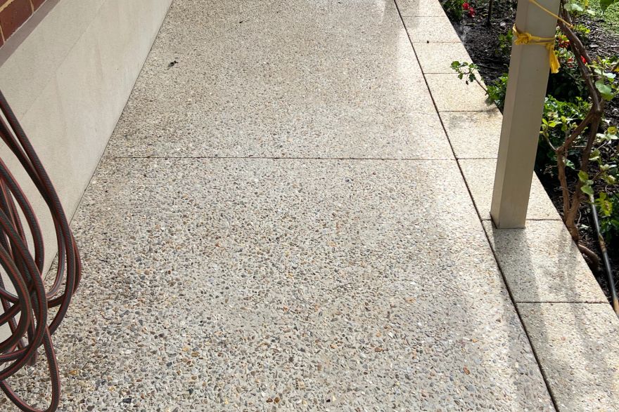Before and after rust / bore stains on concrete exposed aggregate: after