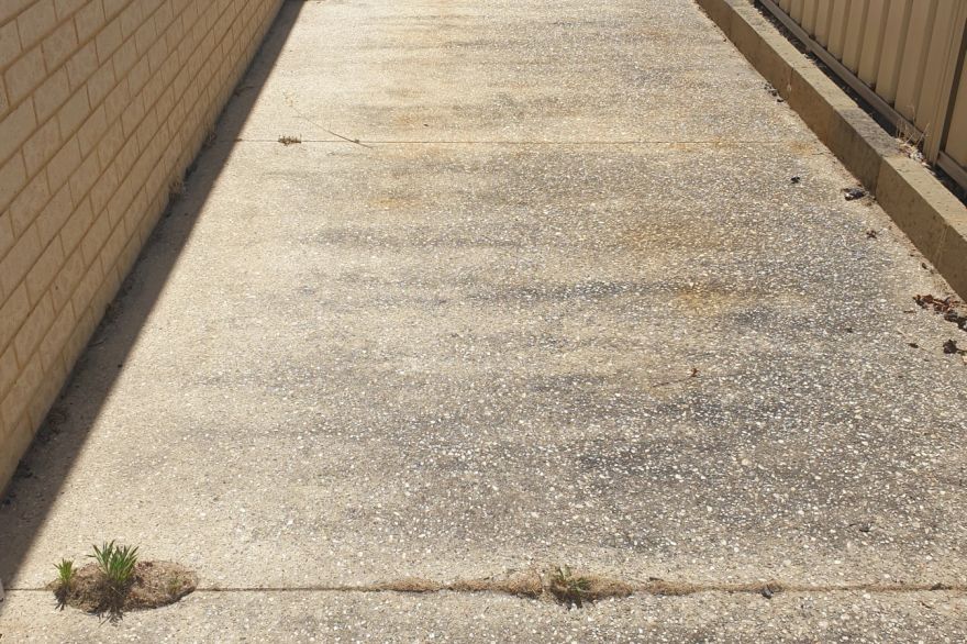 Before and after cleaning on concrete exposed aggregate · Path: before