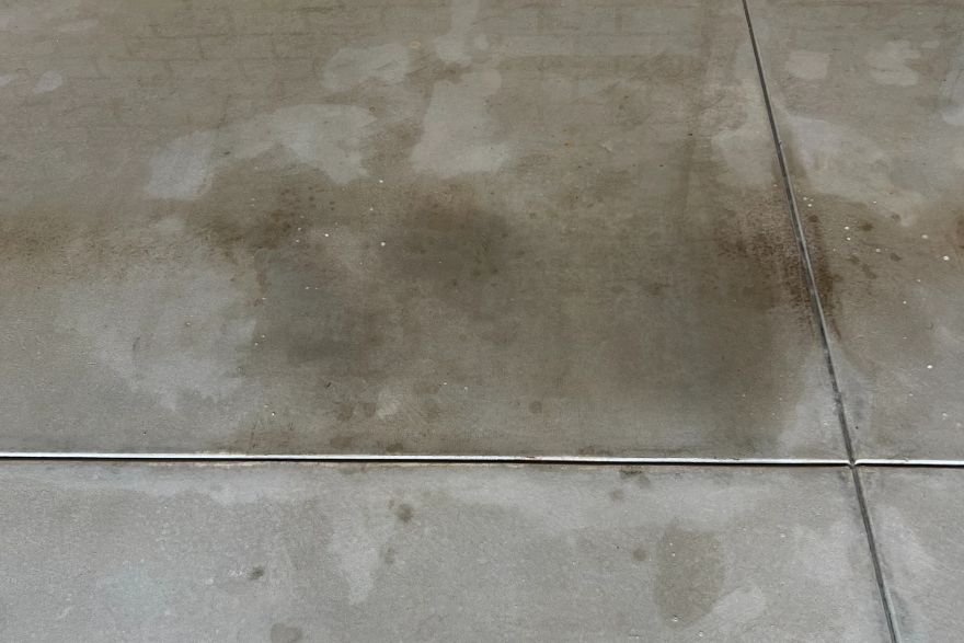 Before and after oil stains on concrete slab · Garage floor: after