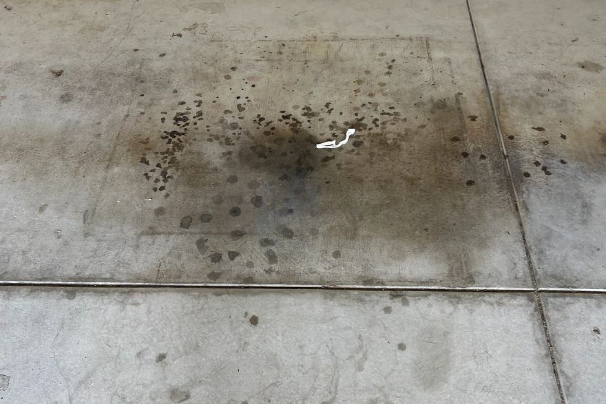 Before and after oil stains on concrete slab · Garage floor: before