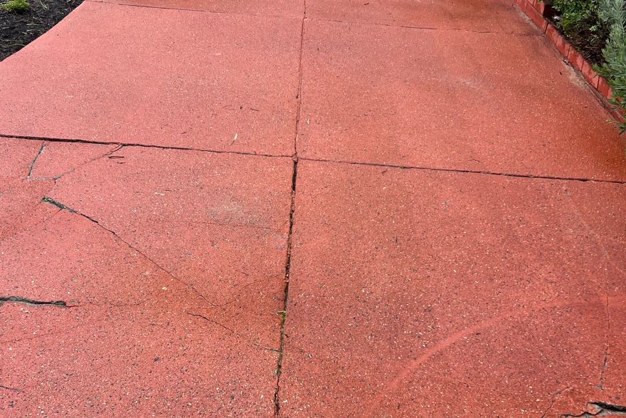 Before and after cleaning on concrete slab · Driveway: after