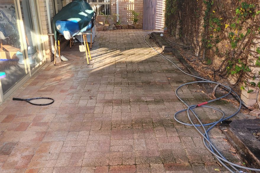 Before and after cleaning on brick pavers · Patio / alfresco: before