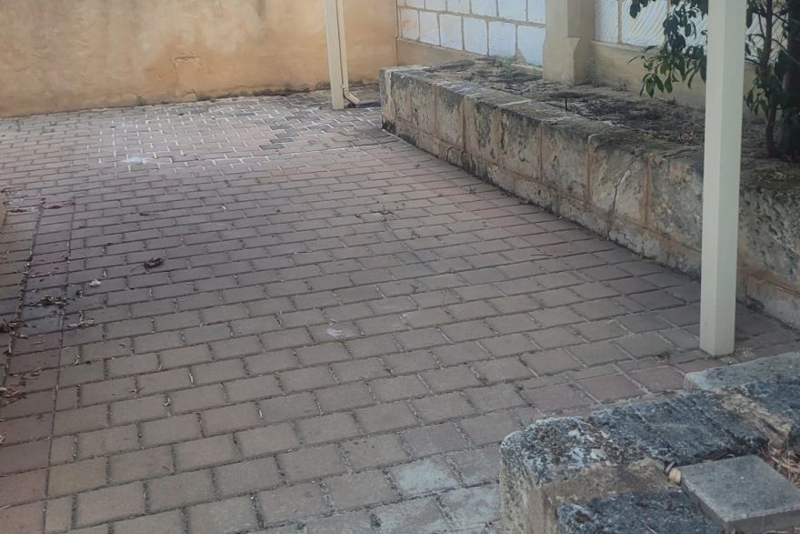 Before and after cleaning on brick pavers · Patio / alfresco: before