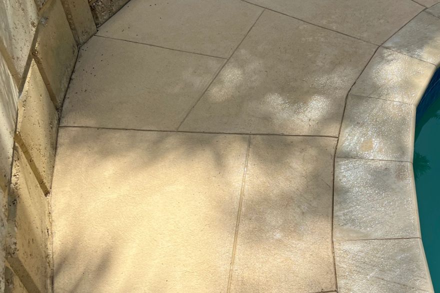 Before and after cleaning on liquid limestone · Poolside: after