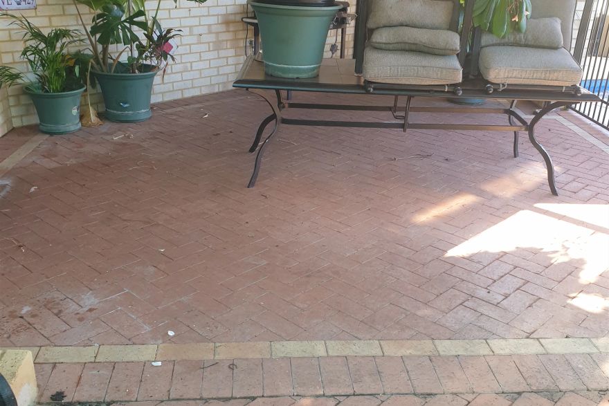 Before and after cleaning on brick pavers · Patio / alfresco: before