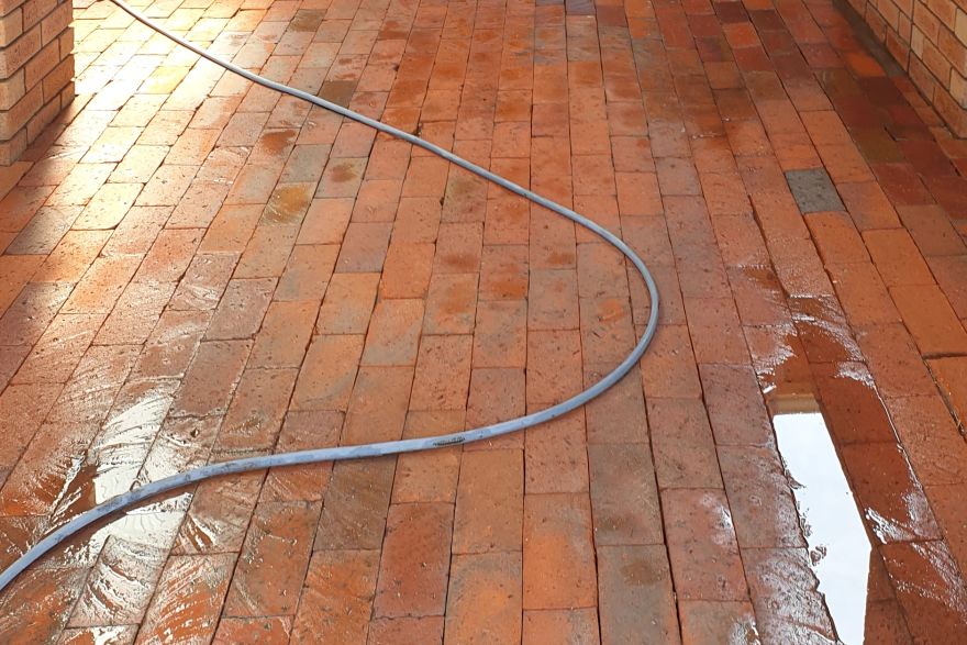 Before and after cleaning on brick pavers: after