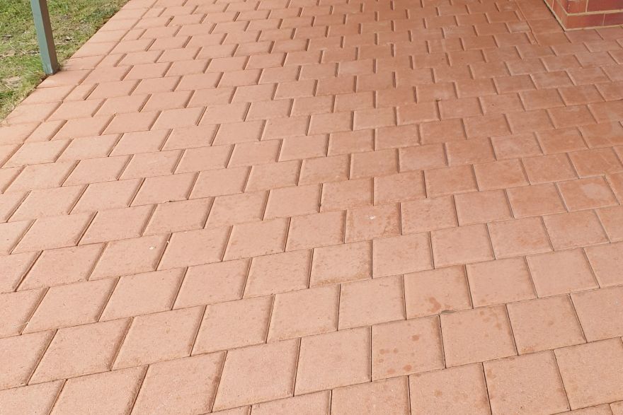 Before and after cleaning on brick pavers: after