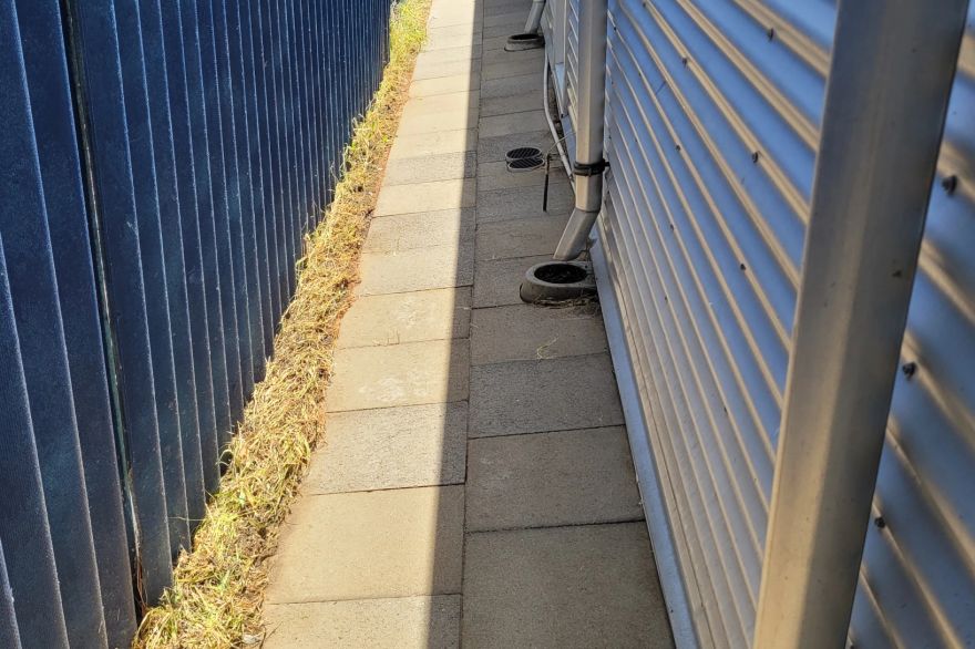 Before and after cleaning on concrete slab · Path: after