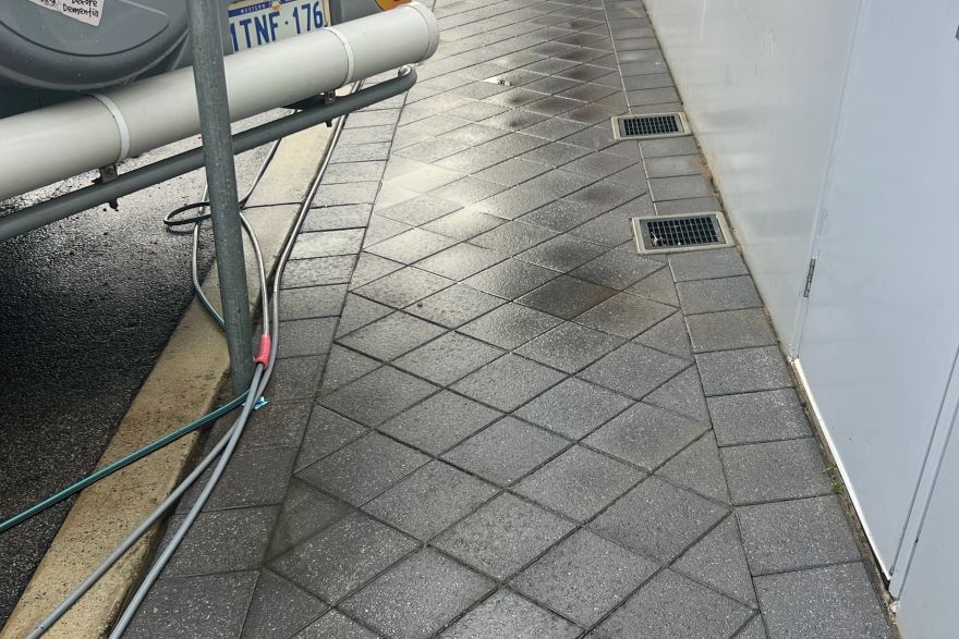 Before and after cleaning on brick pavers: after